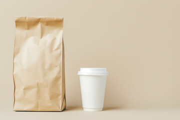 Minimalist image featuring a brown kraft paper coffee bag and a white to-go cup set against a beige background. Ideal for coffee shop branding and takeaway promotions.