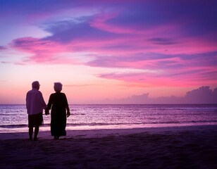 Silhouette of an old couple on the beach staring at the dreamy pastel violet pink colorful sky of sunset or sunrise