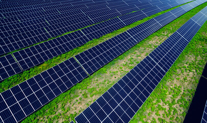 Solar panels or photovoltaic park generating green energy electric.Green energy reduce carbon emissions and makes earth cleaner and more ecological.	
