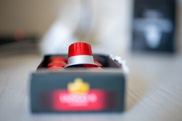 red coffee capsules in close-up