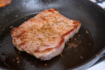 frying pan with steak