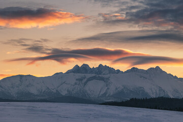 Winter views of the Tatra peaks seen from the Polish  side. The Tatra National Park in its winter attire makes an incredible impression.