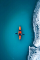 A kayak in crystal clear waters demonstrates , aerial photography, snow scenes, outdoor scenes, bird's eye view