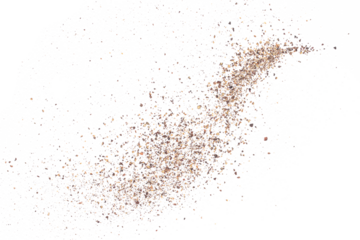 Minced black pepper, ground peppercorn pile flying isolated on white, macro