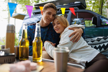 Couple Embraces Peaceful Camping Experience in the Wilderness