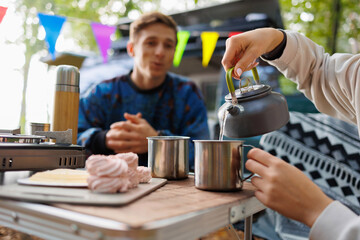 Romantic Tea Time in Nature with a Cozy Camper