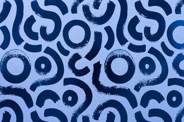 scrapbooking paper pattern featuring short dark blue lines on pastel blue ground