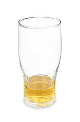 Almost empty glass of beer isolated on white
