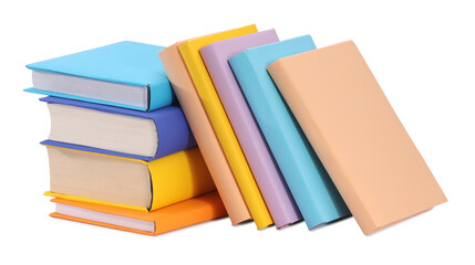 Many bright colorful books isolated on white