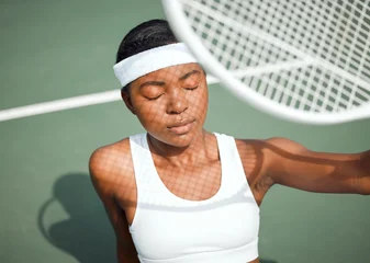 Gordijnen Black woman, relax and racket for tennis on court with sunshine protection, training and sports workout. African, female athlete, uv security and vitamin d of natural heat for exercise of competition © KayJoint/peopleimages.com