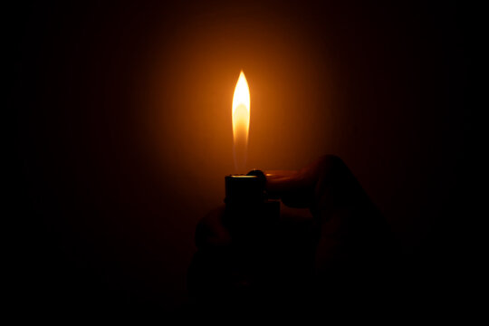 Man's hand with lighter