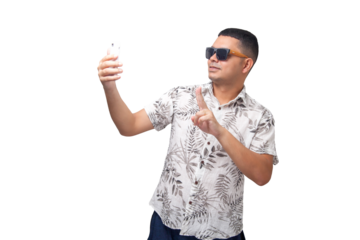 Man on vacation with sunglasses and smartphone. Interacting with cell phone. Device with blank space for mockup. Vacation concept.