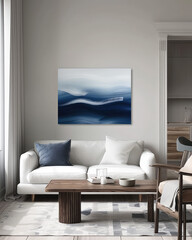 living room in expensive condo development with blue and ocean wave  color theme sofa and wall paper and ocean waves painting  art work on the wall 