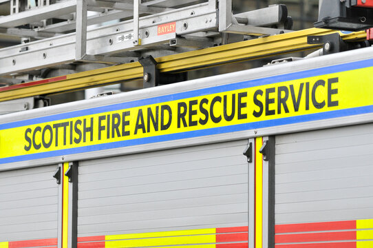 View of a logo for the Scottish Fire and Rescue Service (Scotland, UK) on the side of a fire engine. Was taken during an incident in Glasgow.