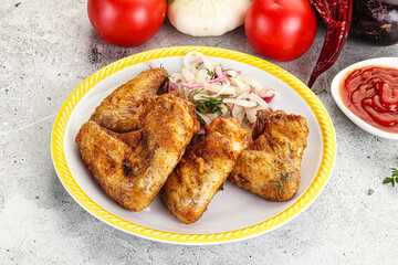 Grilled chicken wings with sauce