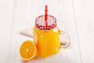 Sweet fresh orange juice in the glass