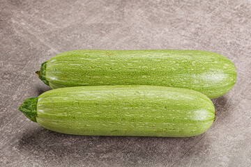 Raw green ripe zucchini vegetable