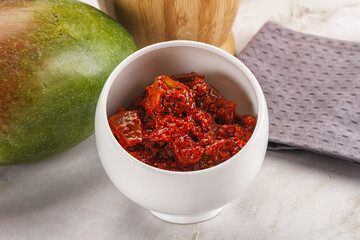 Spicy pickled raw green mango