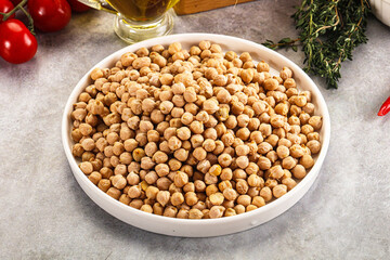 Dry chickpea seeds heap in the bowl