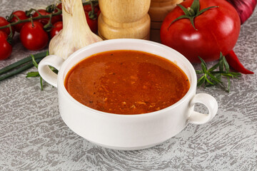 Hot tomato soup with diced chicken