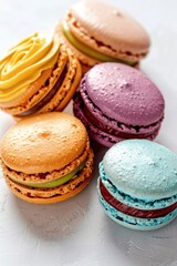 Macaroon desserts with vibrant frosting in pastel colors, assorted flavors. Perfect for a party or a sweet treat.