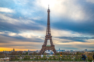 PARIS, FRANCE - MARCH 30, 2024: Eiffel Tower seen from the Jardins du Trocadero in Paris, France. Eiffel Tower is one of the most iconic landmarks of Paris