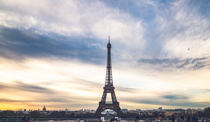 Naklejka premium PARIS, FRANCE - MARCH 30, 2024: Eiffel Tower seen from the Jardins du Trocadero in Paris, France. Eiffel Tower is one of the most iconic landmarks of Paris