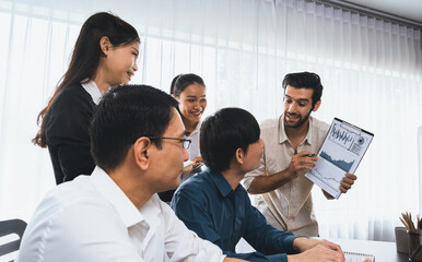 Group of diverse office worker employee working together on strategic business marketing planning in corporate office room. Positive teamwork in business workplace concept. Prudent