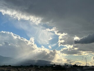 split clouds with rays