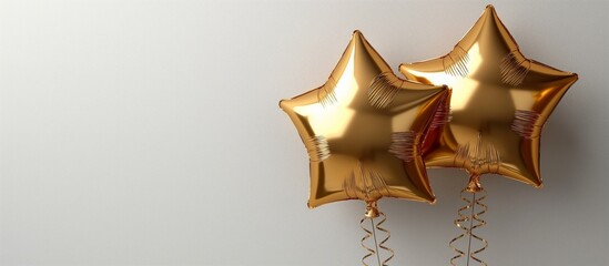 Pair of golden star balloons floating against a light background, symbolizing celebration, joy, and special moments and occasions