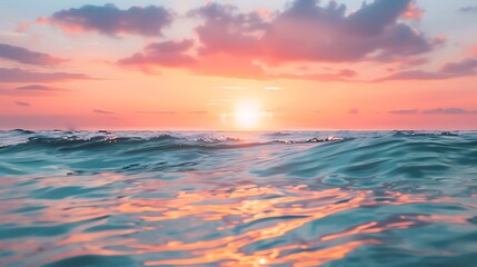 Obraz premium A sunset painting the sky and water with pink and orange tones