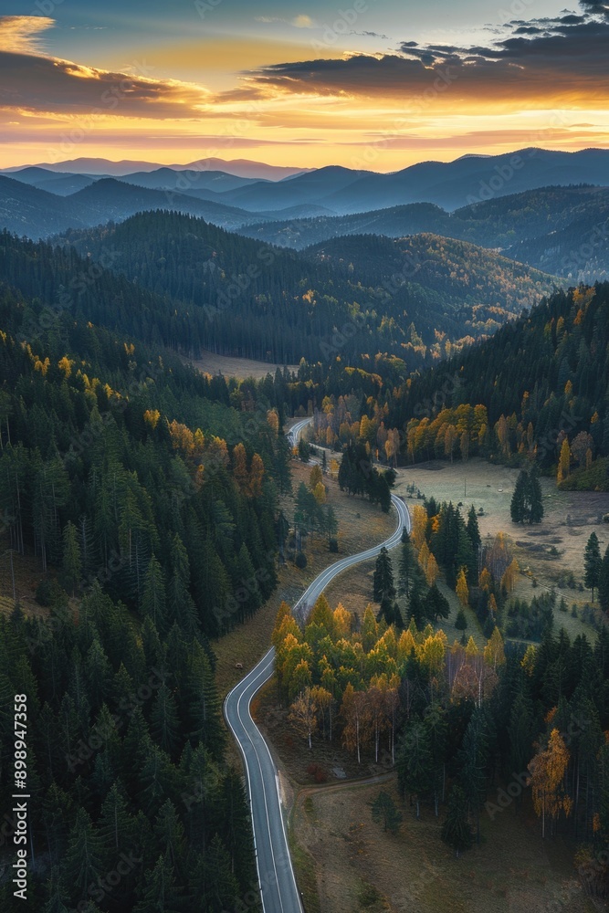 Poster aerial view of a winding road in the mountains, suitable for use in travel or adventure concepts