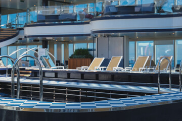 Glass dome Roof covered solarium indoor swimming pool onboard modern luxury cruiseship cruise ship...