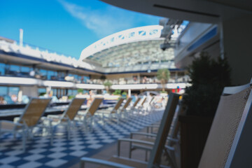 Glass dome Roof covered solarium indoor swimming pool onboard modern luxury cruiseship cruise ship...