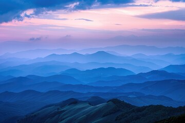 A scenic view of a mountain range during sunset, suitable for use in travel or adventure themed projects