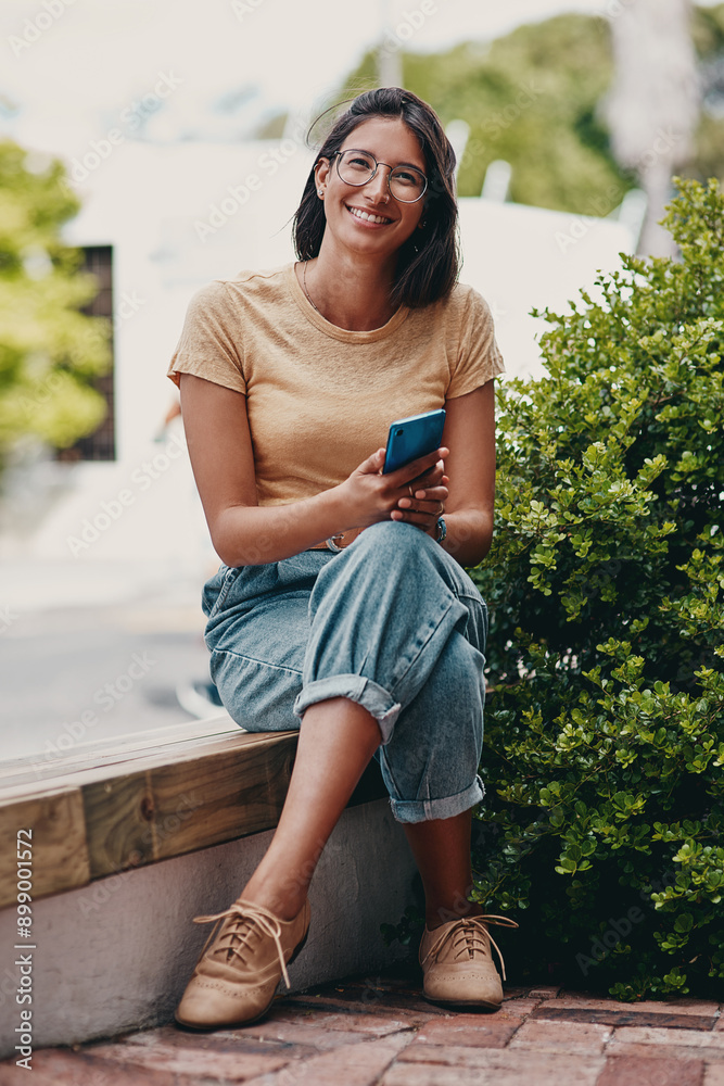 Sticker Smile, smartphone and face of business woman with positivity, happy and confident attitude. Entrepreneur, pride and texting professional, creative designer or freelancer in outdoor garden park