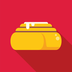 Delicious cinnamon roll drizzled with white icing on a vibrant red background