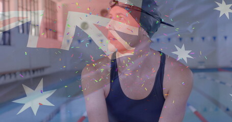Image of confetti over caucasian female swimmer and flag of australia