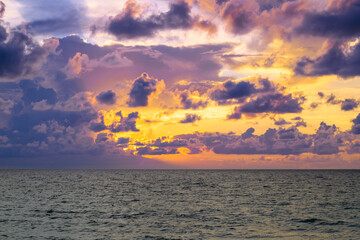 Seascape with dramatic sky and colorful clouds. Sky over sea water landscape. Stormy dramatic sky. Scenic seascape at sea.