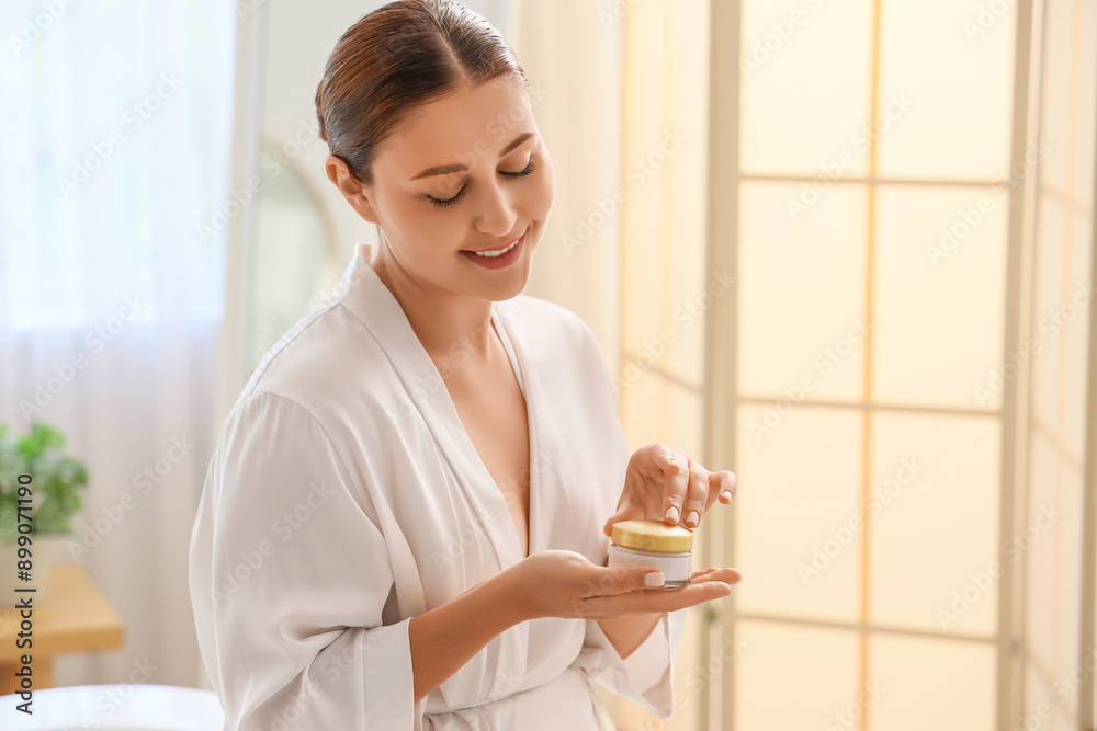 Sticker Beautiful plus size woman with jar of cream in bathroom