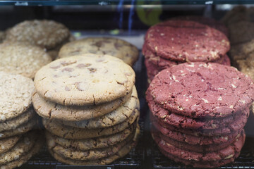 Many different cookies on trays display bakery cafe