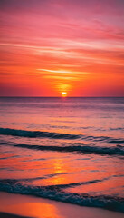 Fototapeta premium A beautiful sunset over the ocean with vibrant colors in the sky