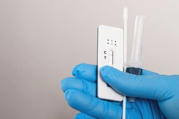 Doctor with Covid-19 test kit from the lab at the hospital