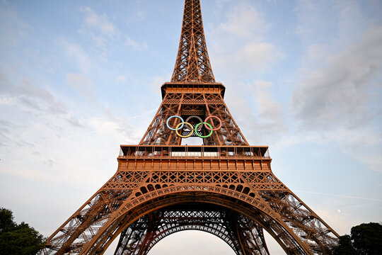Illustration picture shows the Eiffel Tower (Tour Eiffel) with the Olympic rings ahead of the XXXIII Paris 2024 Summer Olympic Games on July 17, 2024 in Paris, France.