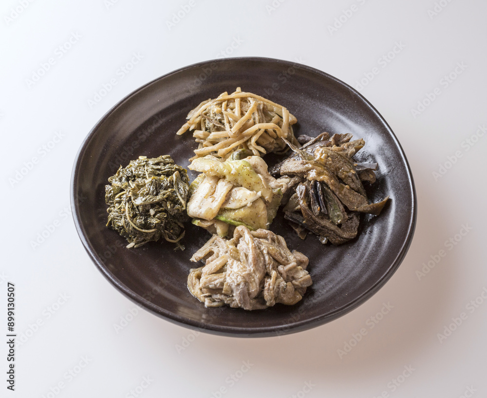 Sticker Close-up of seasoned taro stems with various vegetable like castor bean, sweet potato, egg plant and pumpkin on a jar, South Korea
