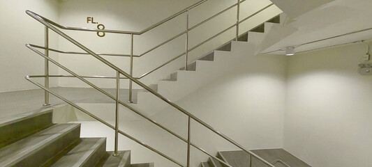 exit fire cement staircase wallway landing up or down in building