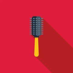 Round hairbrush with yellow handle lying on red background, beauty and haircare concept