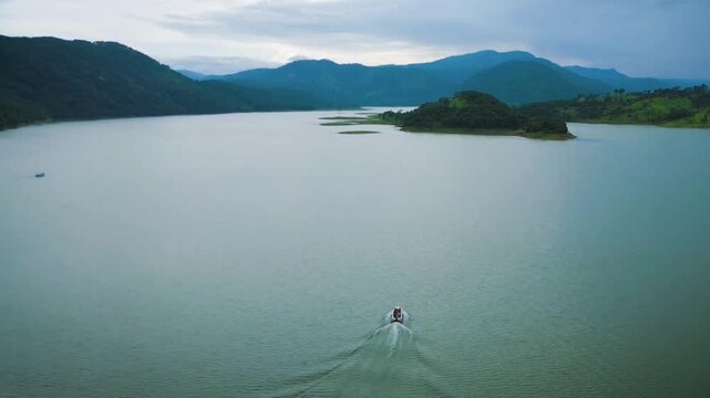 Aerial drone View of Mountain & Lake Drone footage, of river and beautiful natural green forests on a sunny summer day in, Umiam Lake, Meghalaya