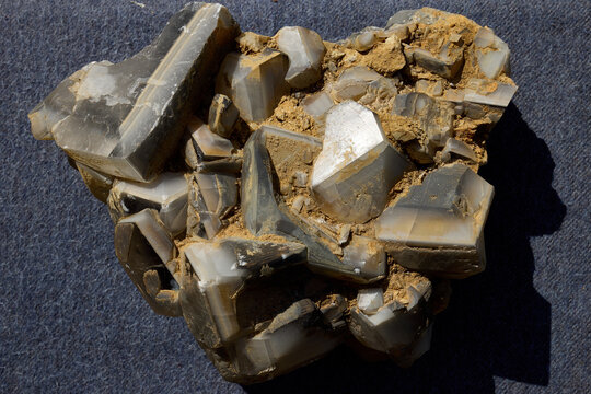 Calcite crystals, a mineral from the class of natural carbonates, one of the natural forms of calcium carbonate CaCO3. Close-up of some calcite mineral crystals. Part of a calcite druse