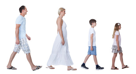 Fototapeta premium Happy family of four, with parents and two children, walking